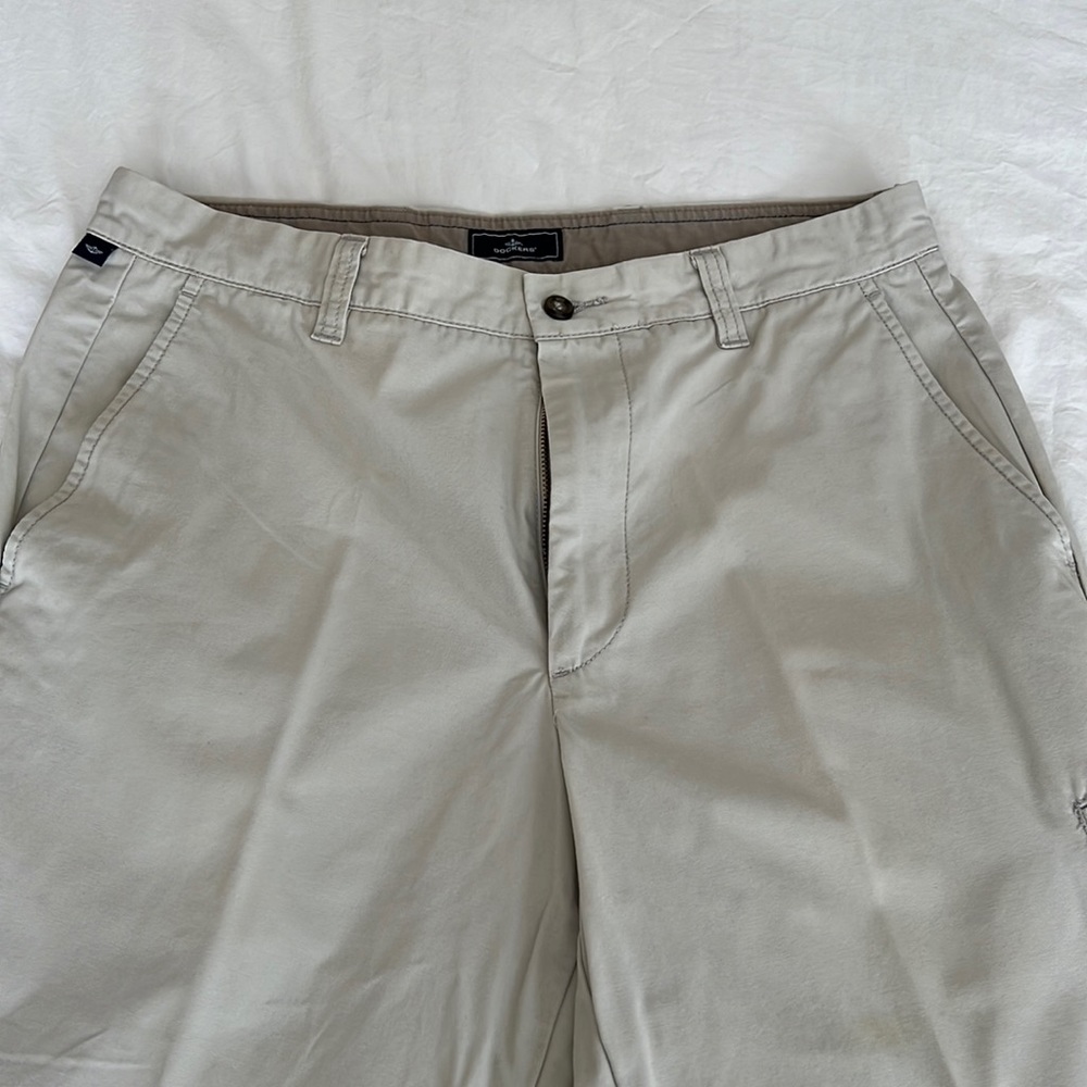 Mens light tan khaki slacks. 100% cotton, waist 34, inseam measures 31.
